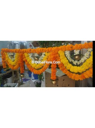 Flower Toran Of Fresh Marigold Yellow Orange And Tuberoses With Golden Ball