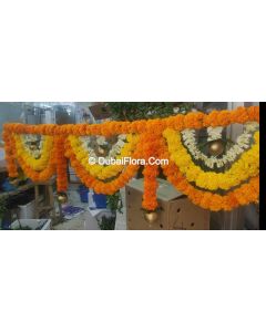 Flower Toran Of Fresh Mariegold Yellow Orange And Tuberoses With Golden Ball
