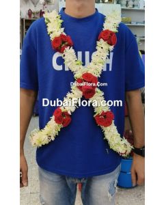 baddi with tuberoses and red baby roses 